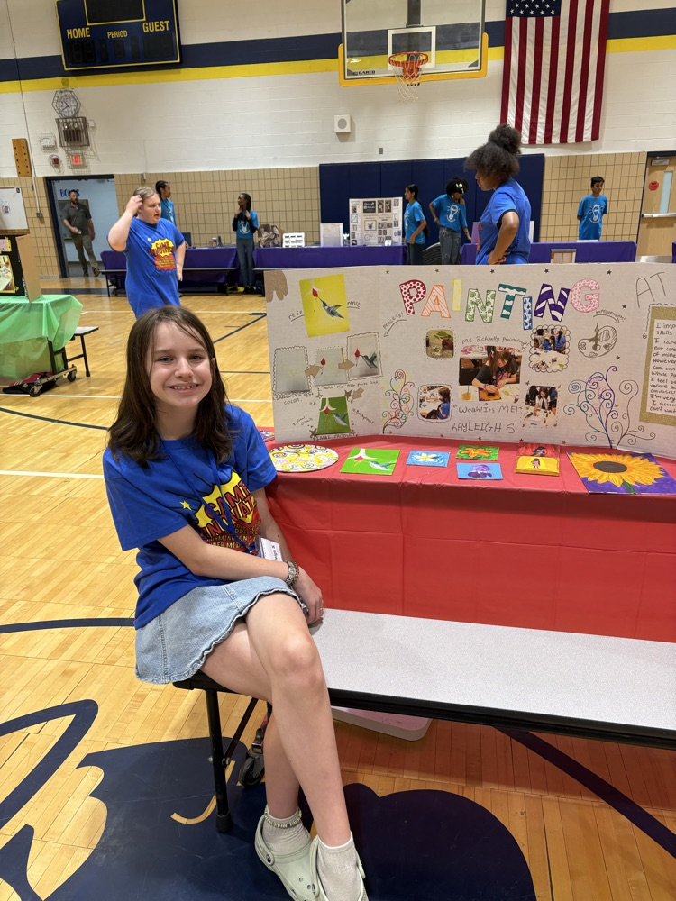 Student sharing her beautiful art work .
