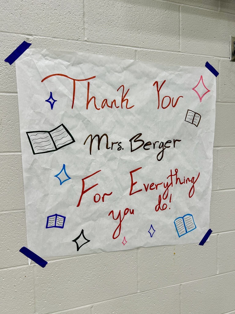 A sign for Mrs. Berger on the wall