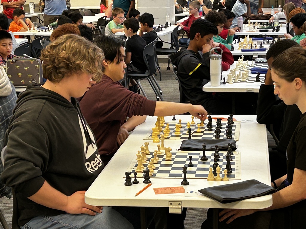 student playing chess