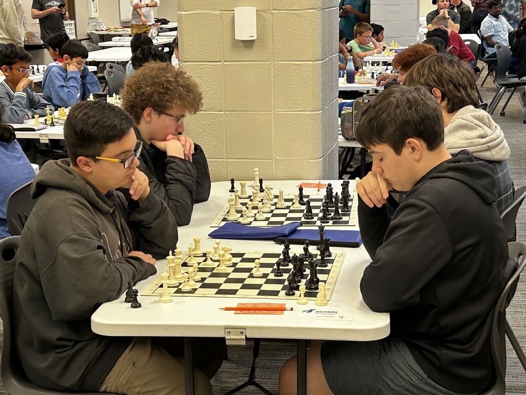student playing chess
