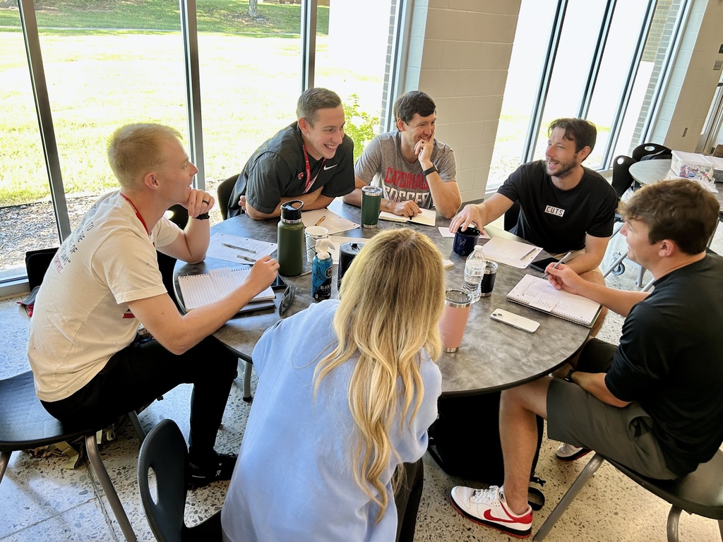 Teachers working together at table