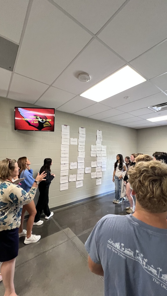 students learning in hallway