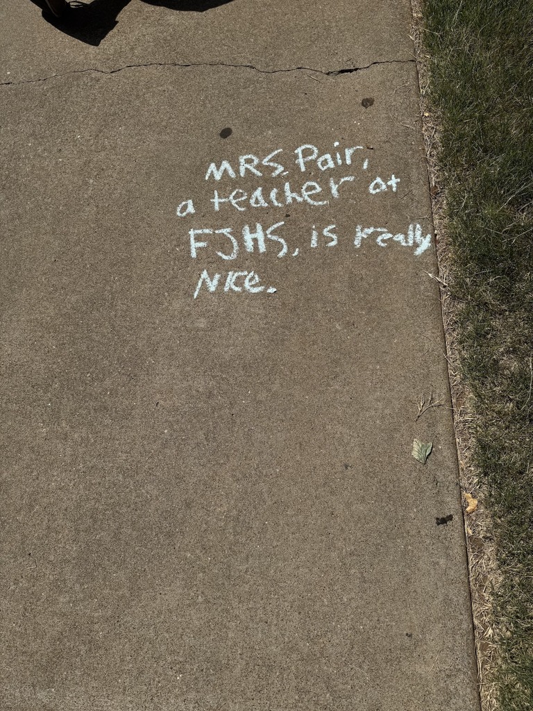 Close up of writing on sidewalk