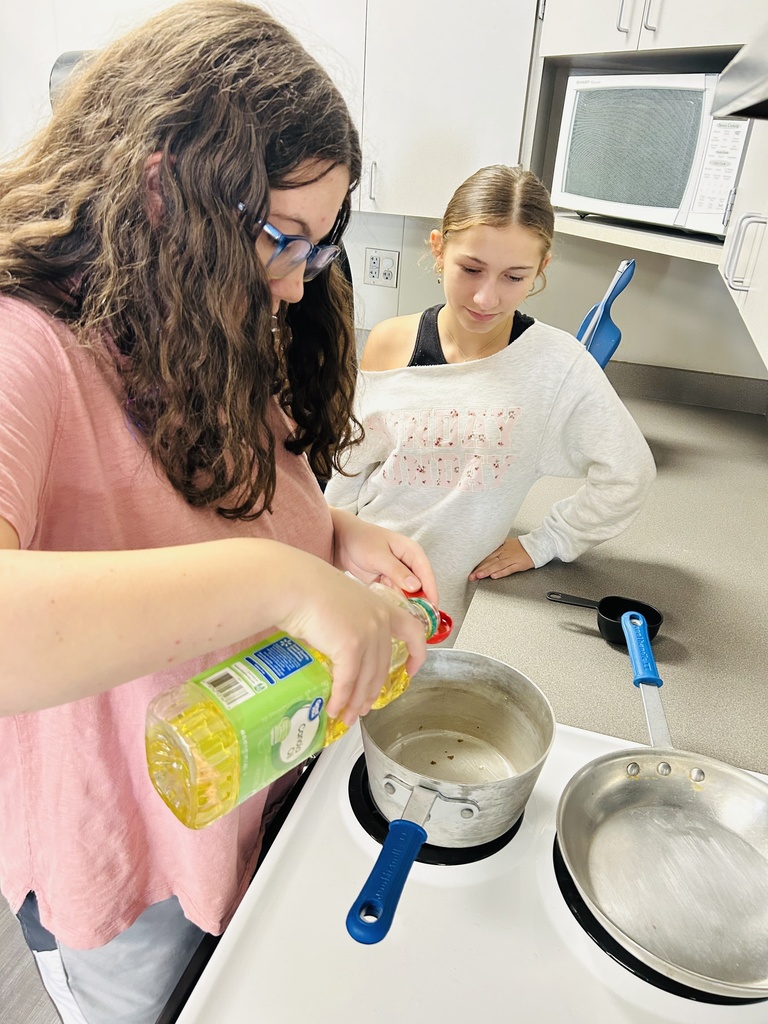 Students in FAC cooking popcorn