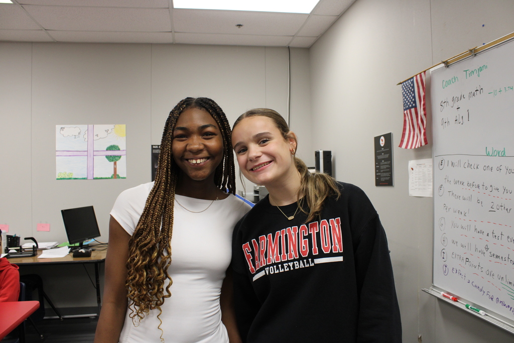 two friends posing
