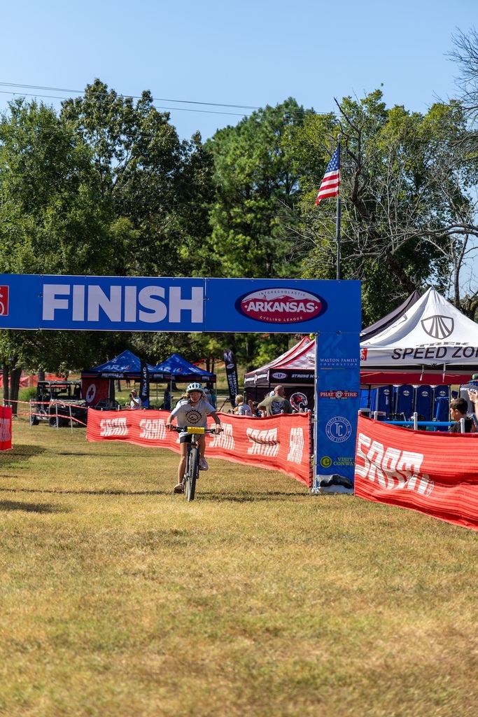 Farmington student rides bike past finish line