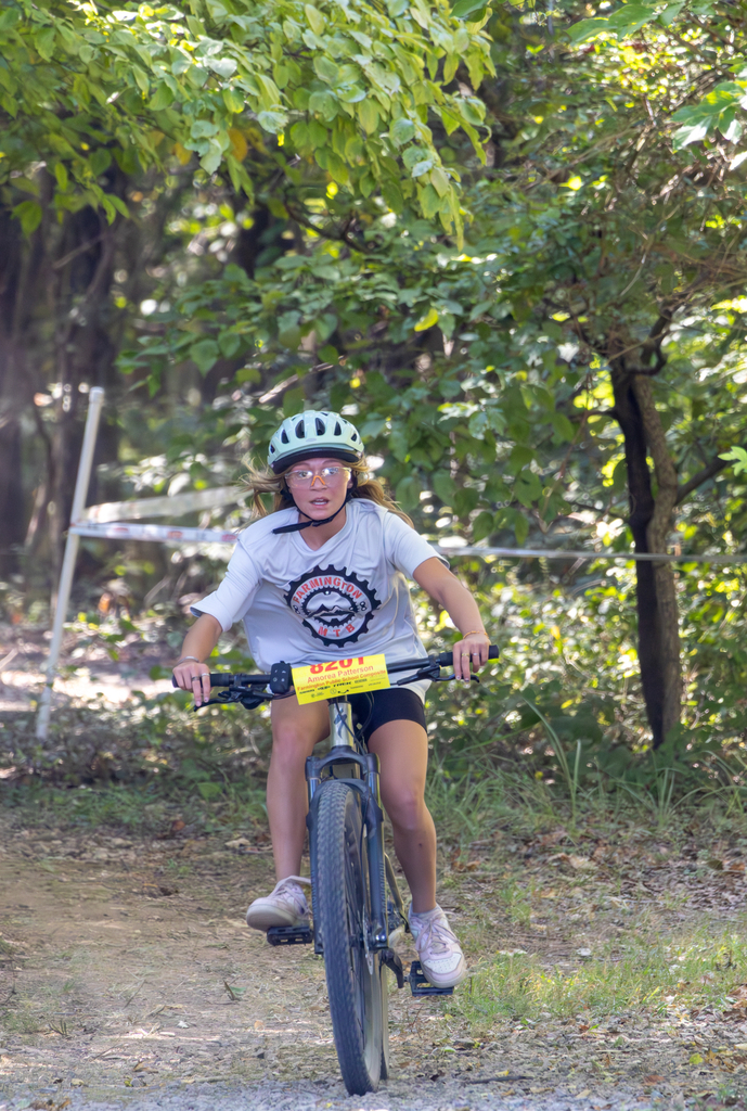 Farmington student rides mountain bike course