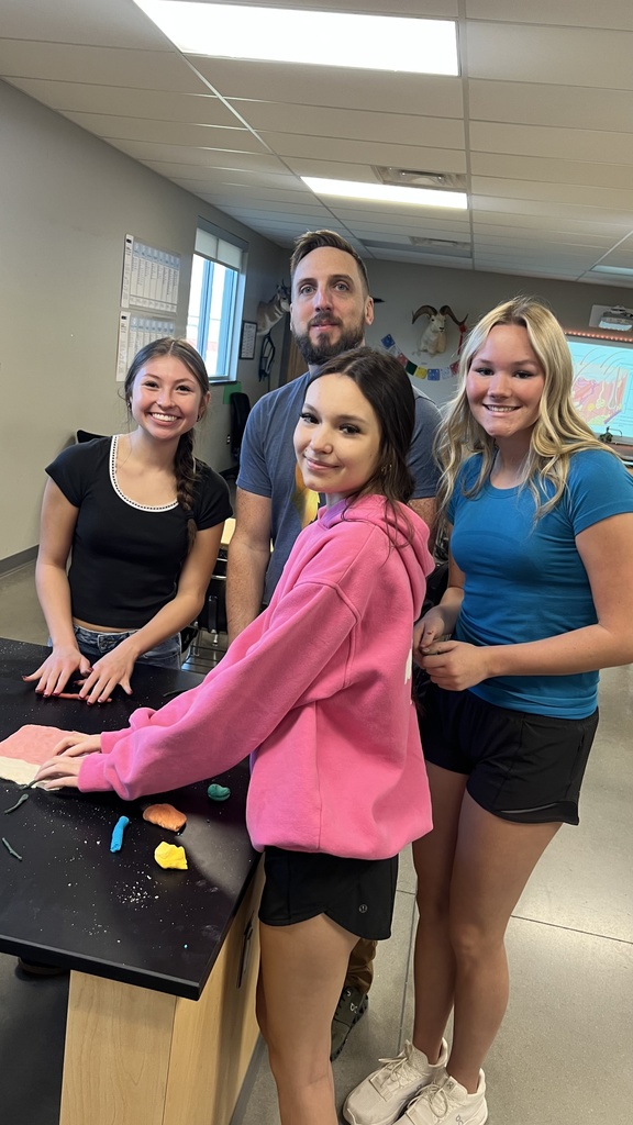 students working with playdoh