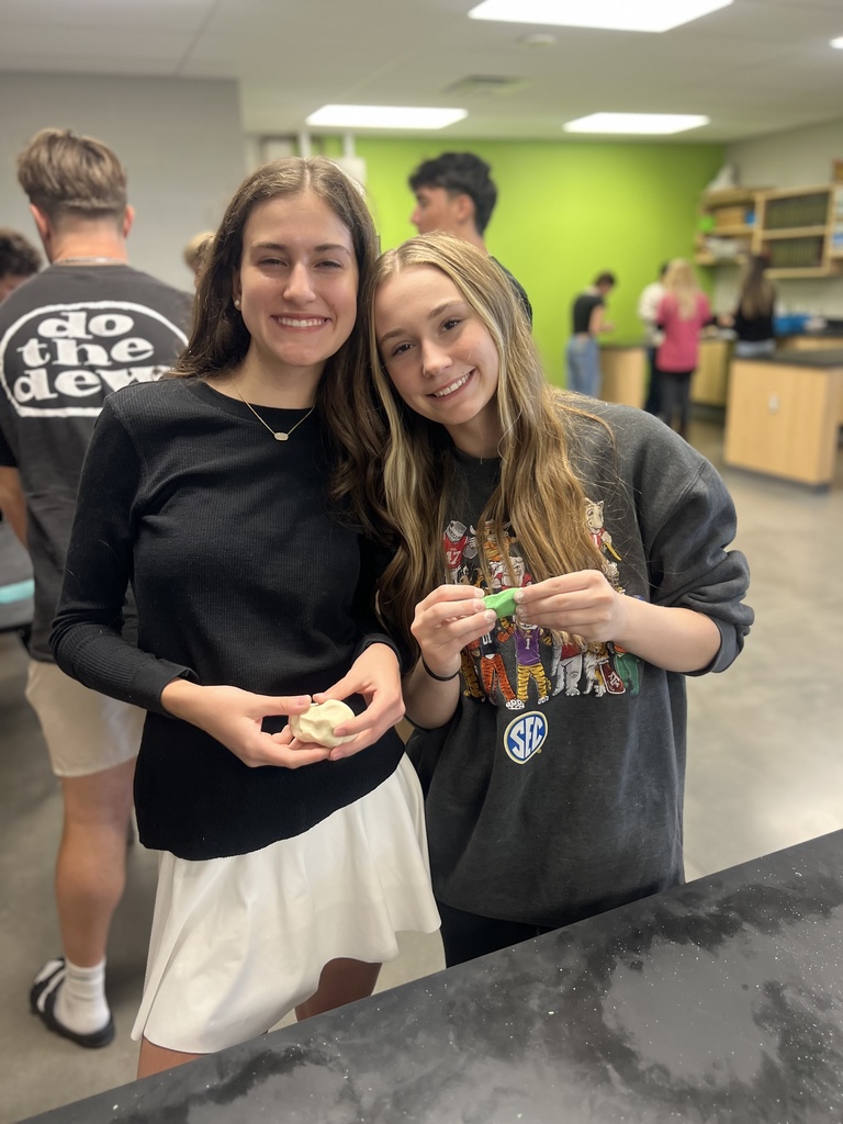 students working with playdoh