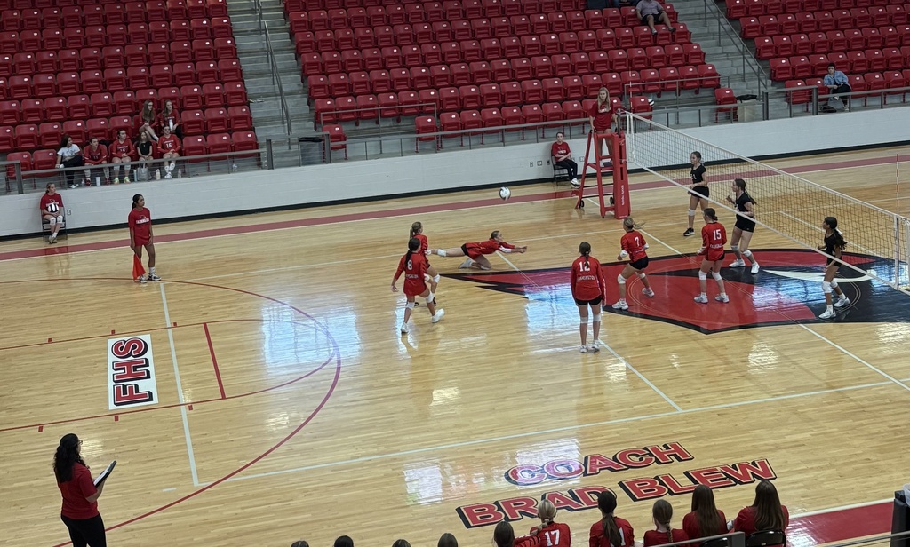 Volleyball player dives on the floor