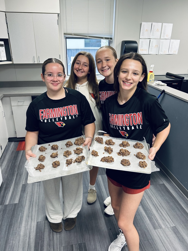 Students showing off their no-bake cookies