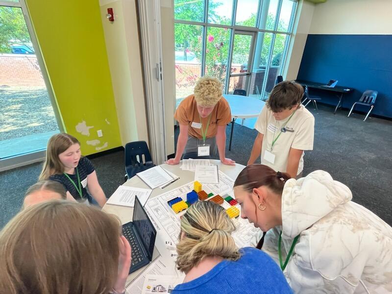 students working together around a table