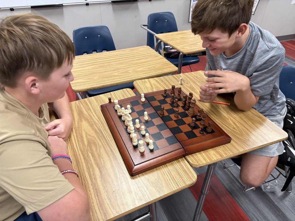 2 students playing chess