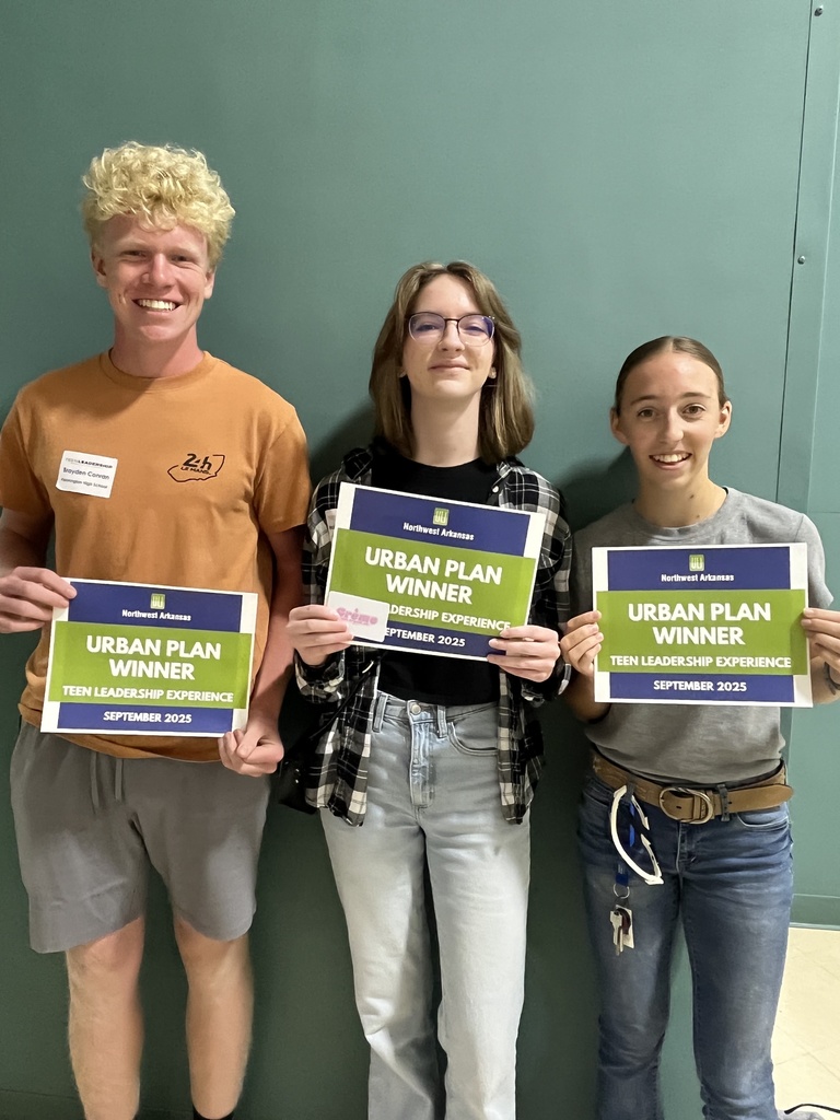 students posing with certificates