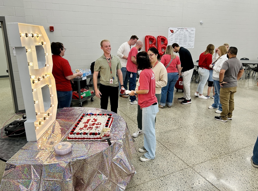Teachers socializing during the celebration