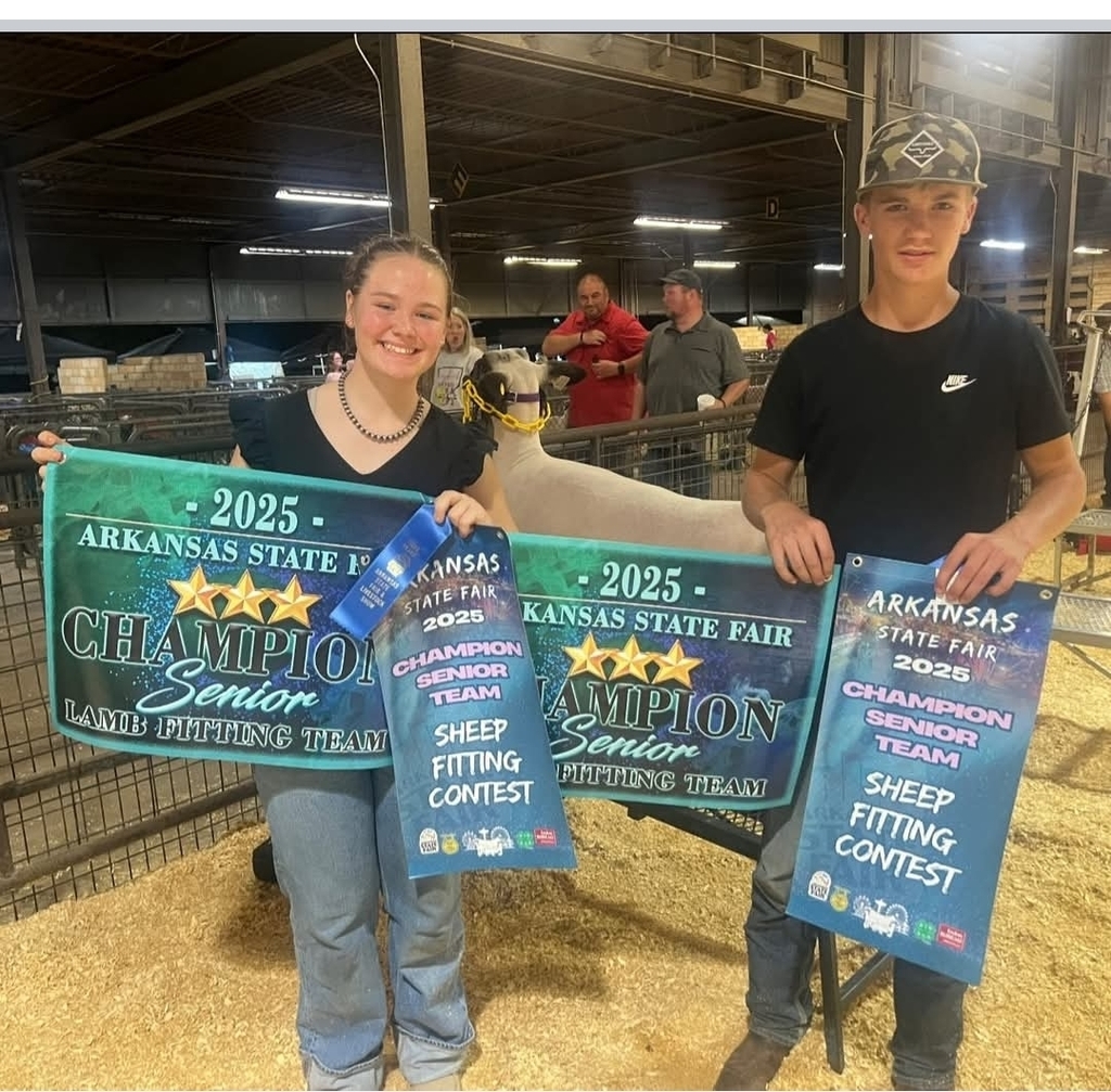 picture of students posing with awards 