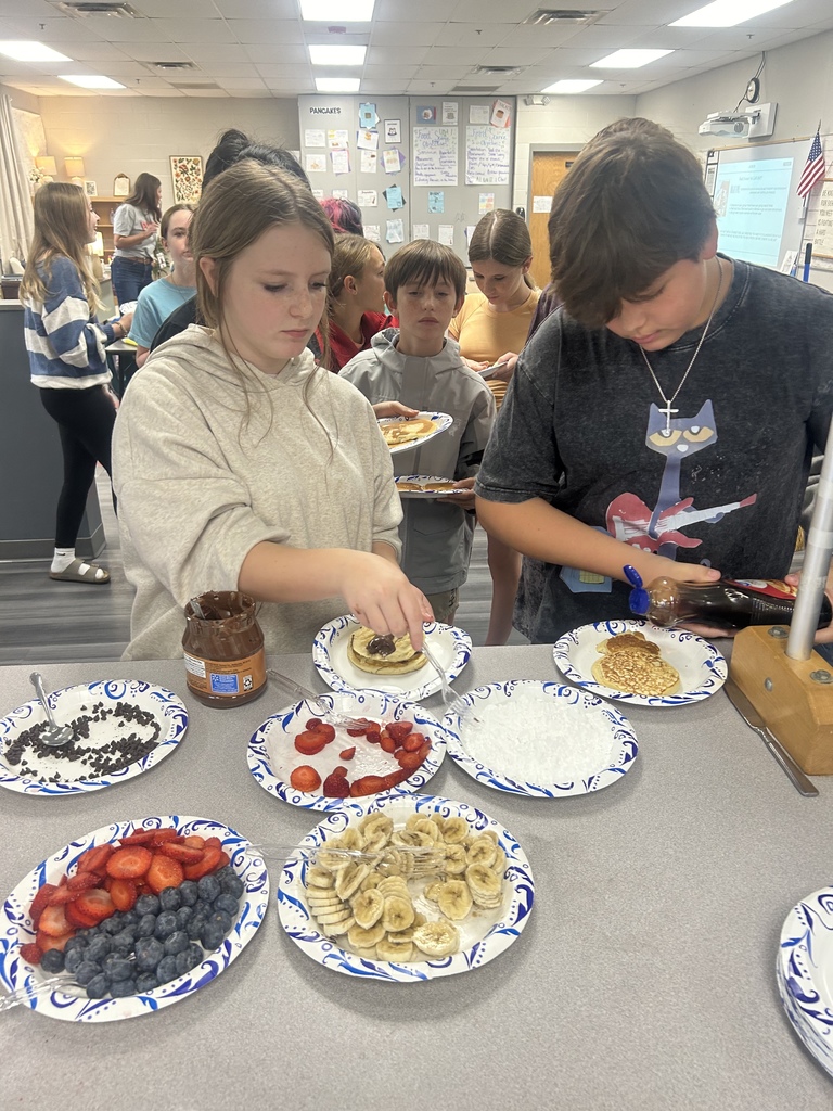 Adding pancake toppings