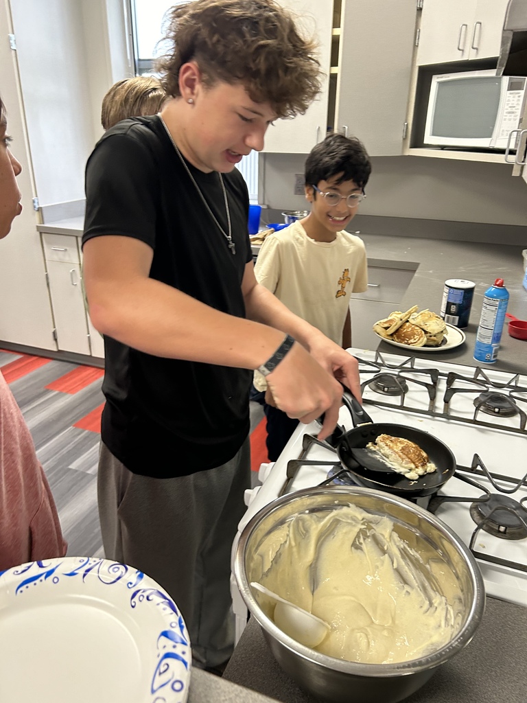 Student making pancakes