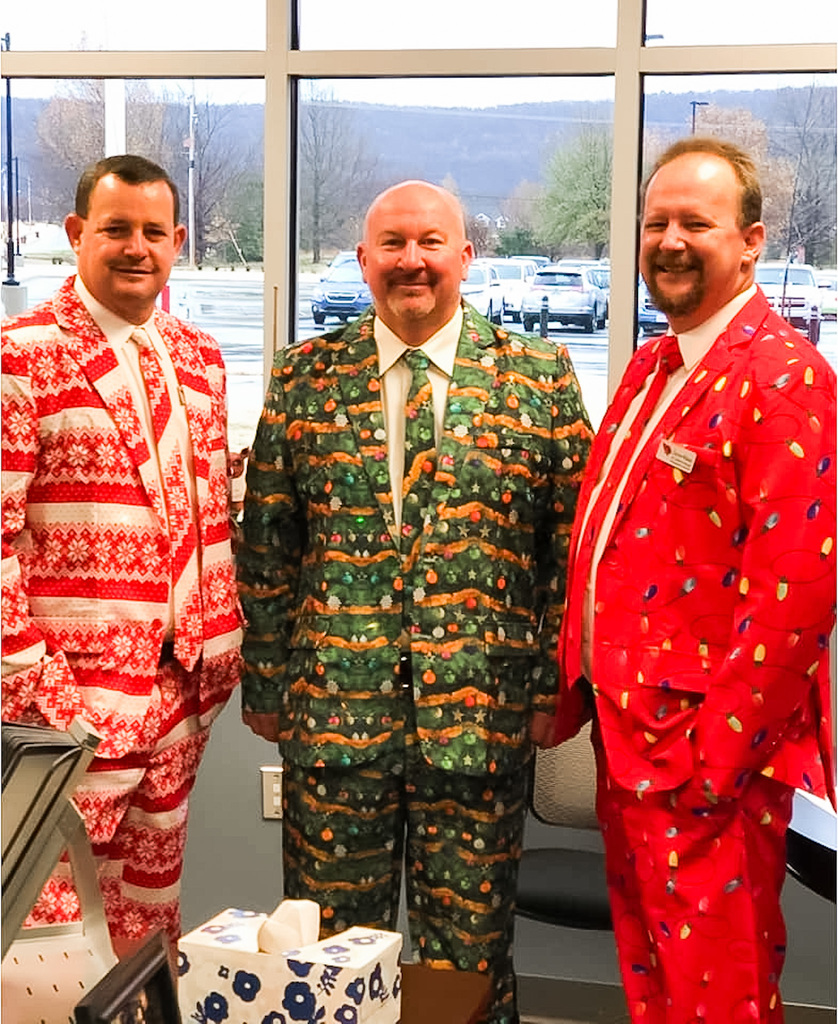 principals posing together in office