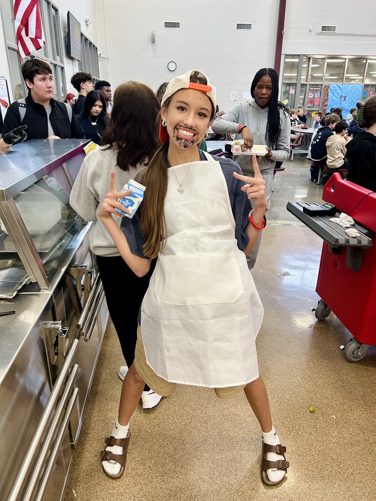 Students dressed up as soccer moms/bbq dads