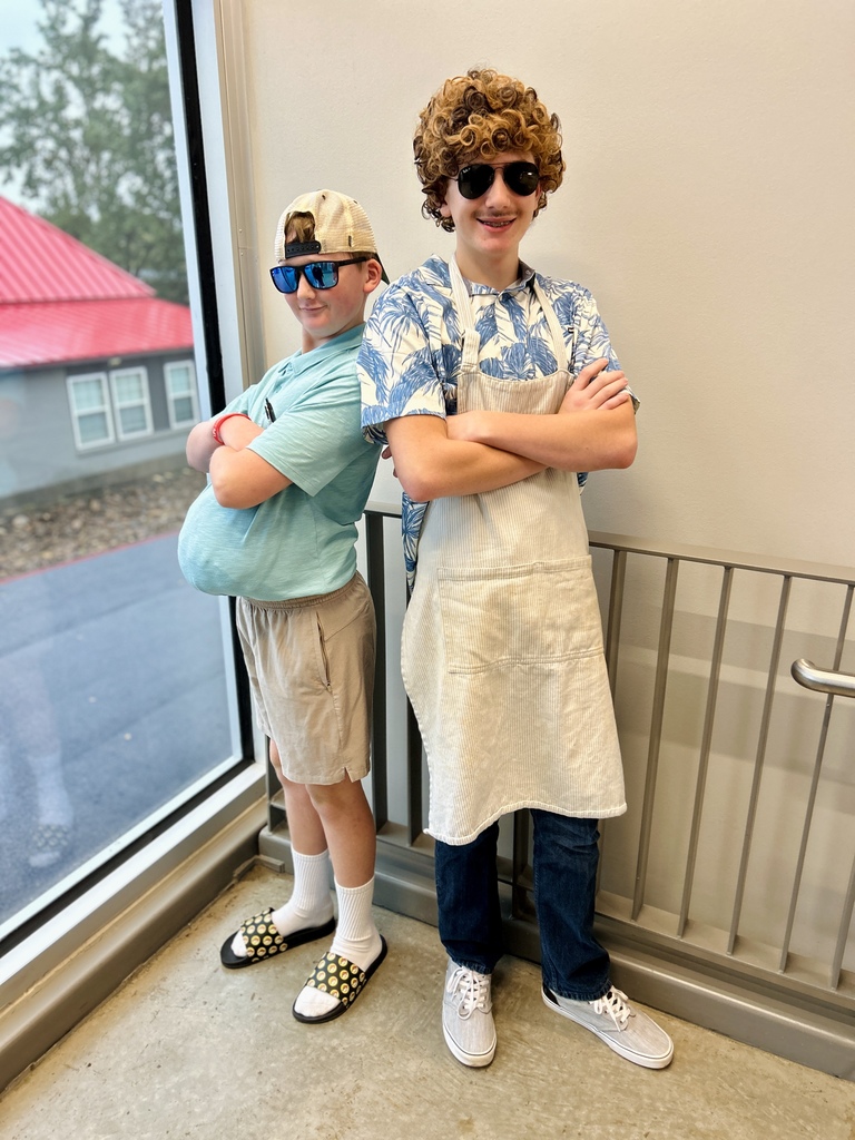 Students dressed up as soccer moms/bbq dads