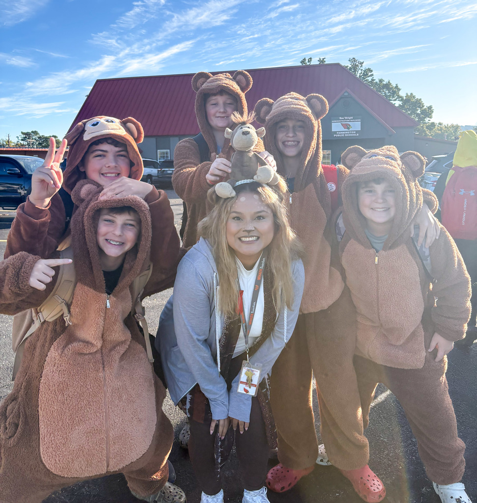 Students and teacher dressed up for halloween