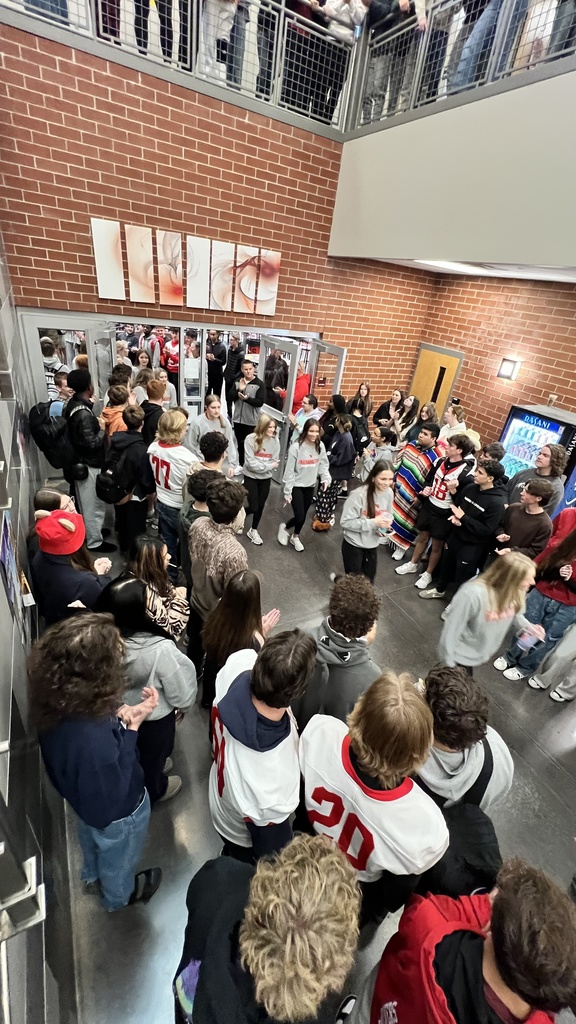 students walking through spirit line