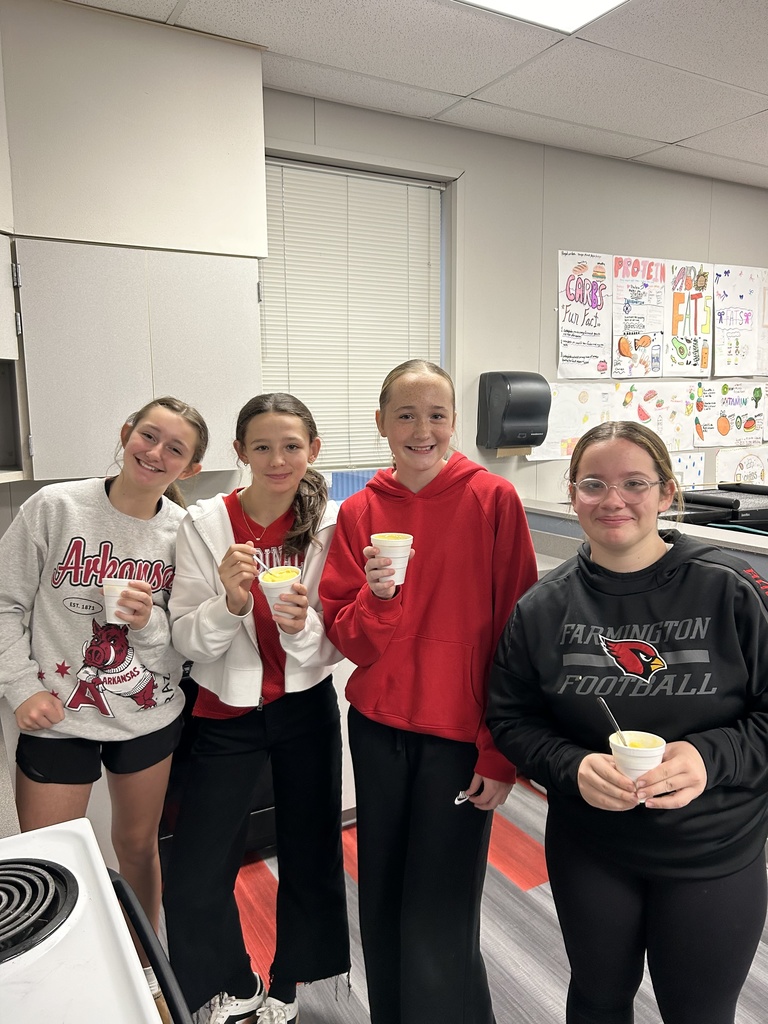 Students in FAC holding smoothies