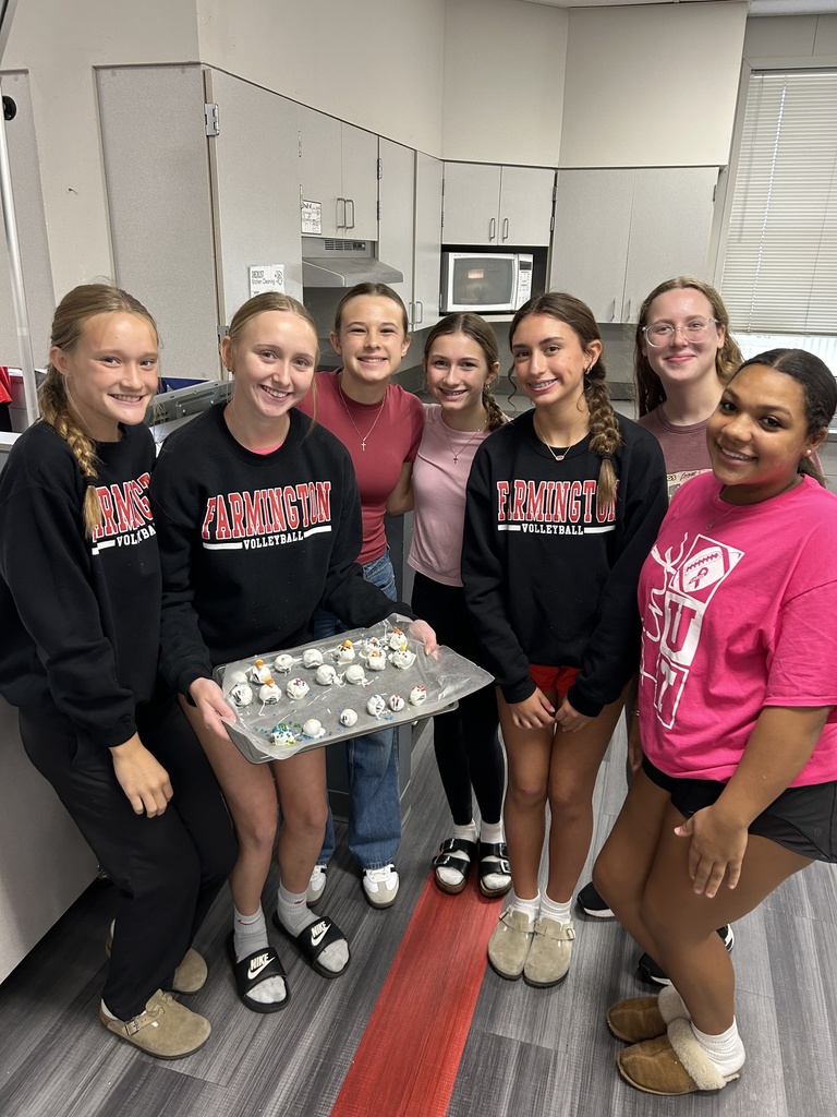 Students in FAC holding tray of Oreo balls