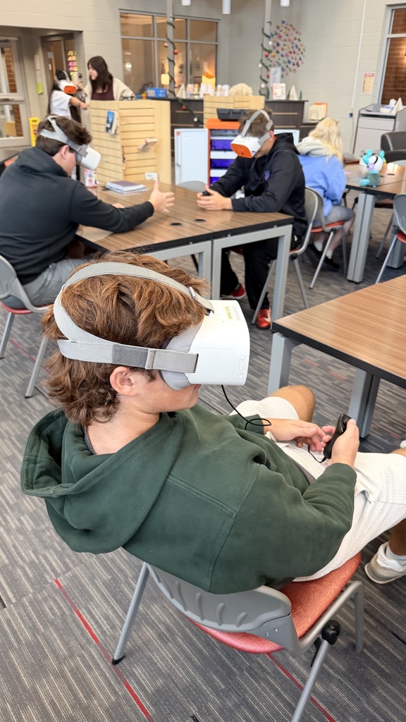 students doing virtual reality