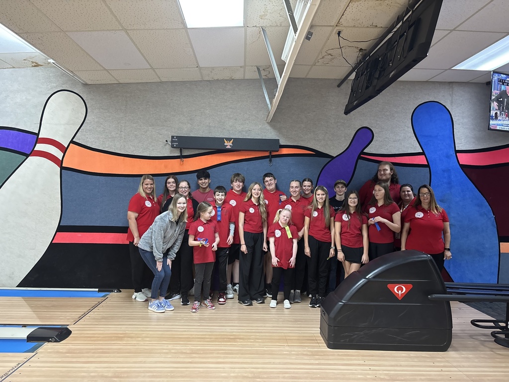 group photo at the bowling alley