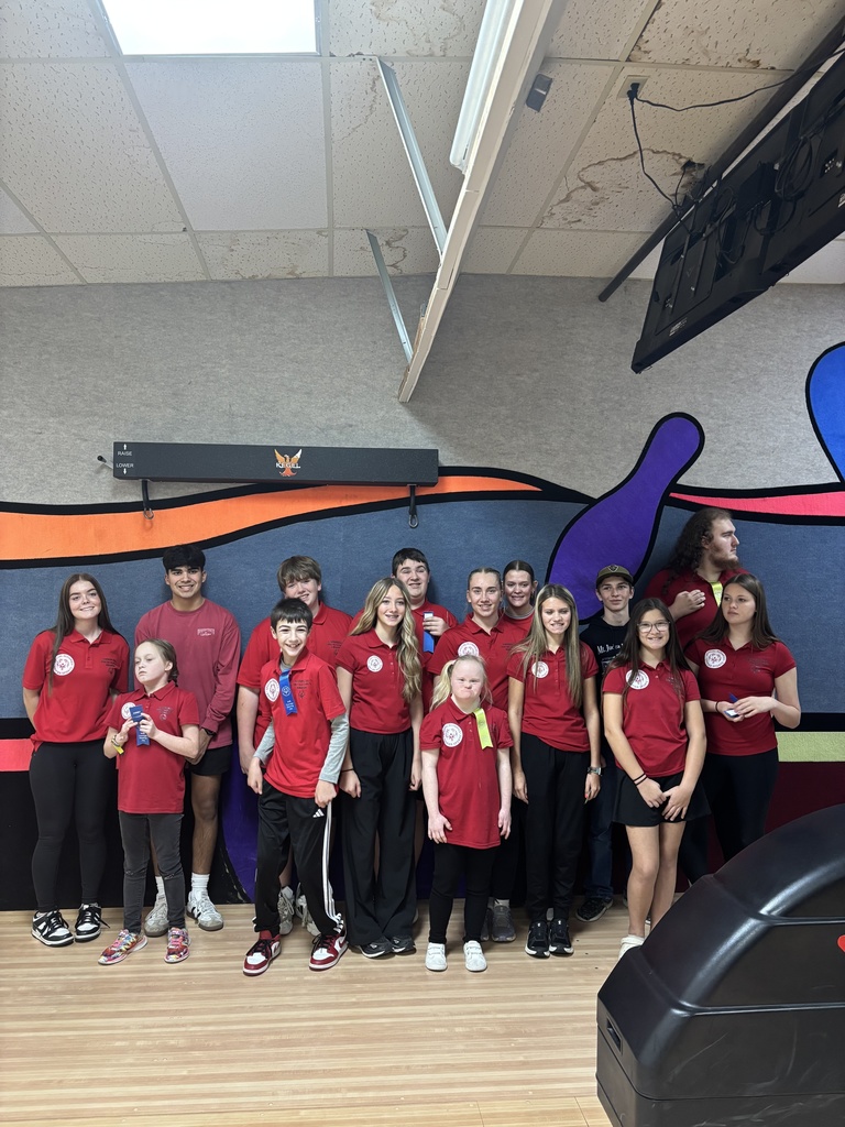 group photo at the bowling alley