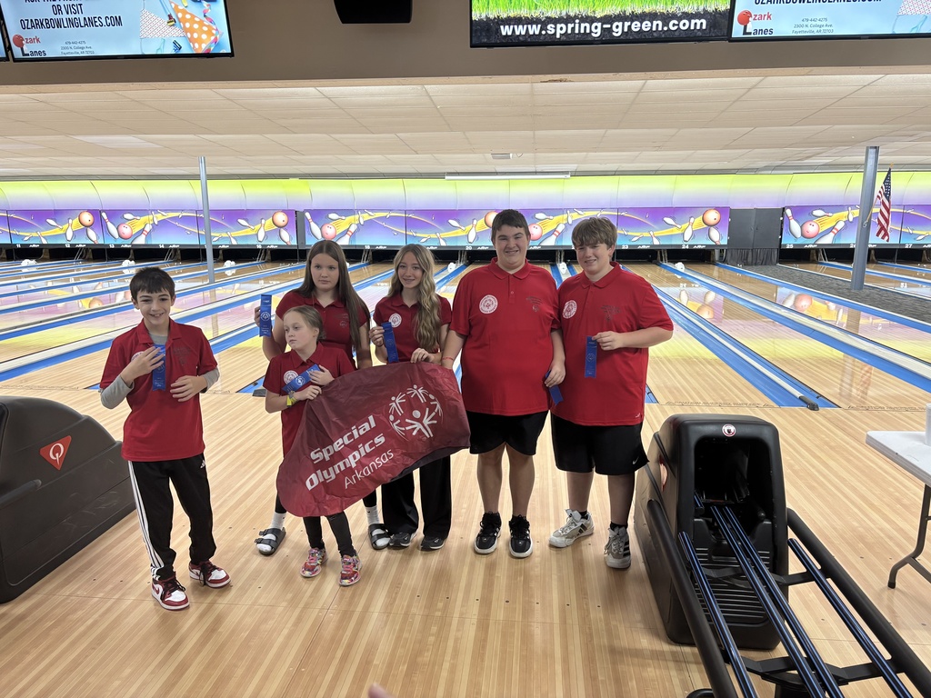 group photo at the bowling alley