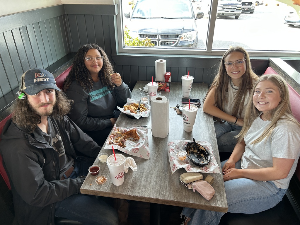 Student Champions eating lunch