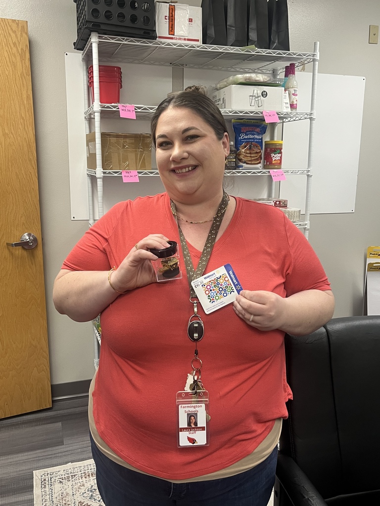 Mrs. Jackson holding her prize