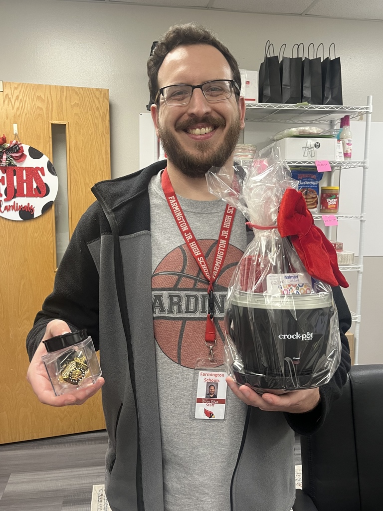 Mr. Silva holding his prize