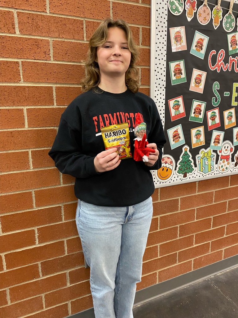 picture of student and hiding elf