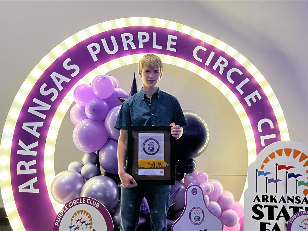 Corbin Young with award