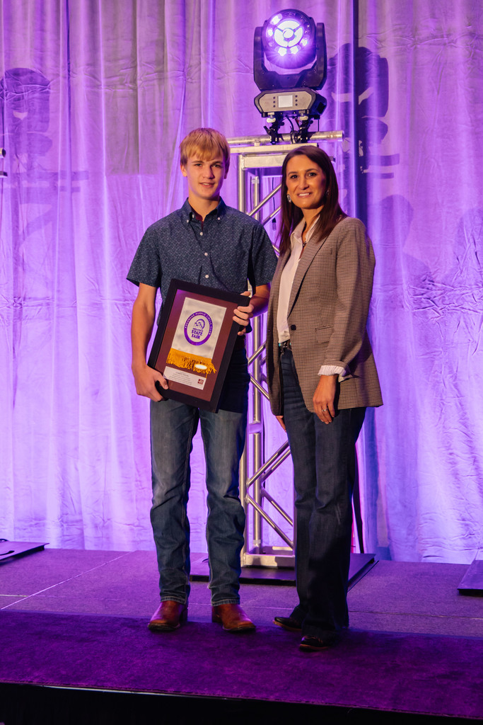 Corbin Young with award