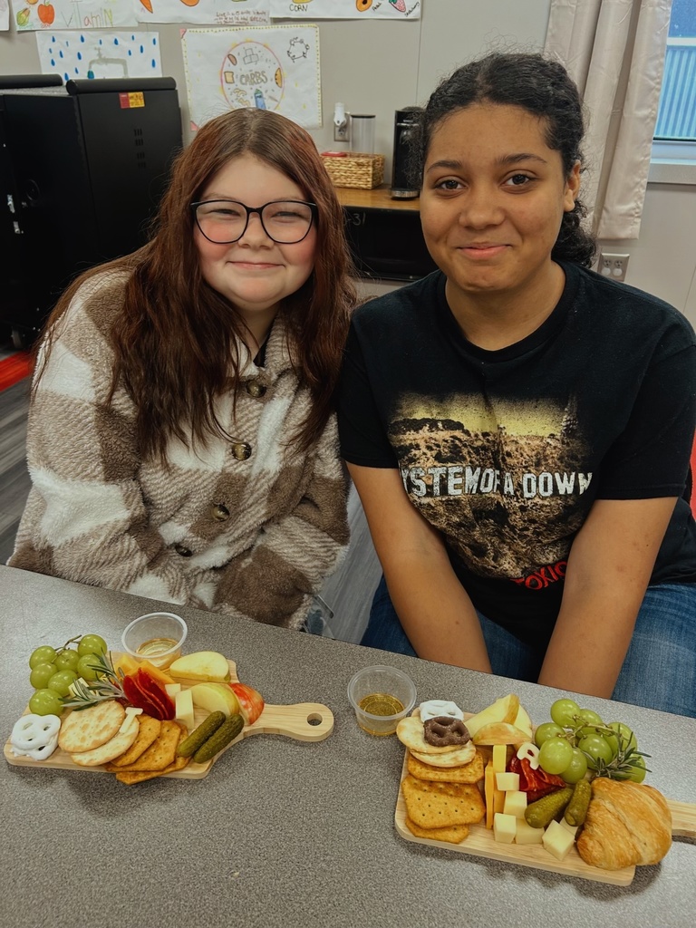 Student with charcuterie board