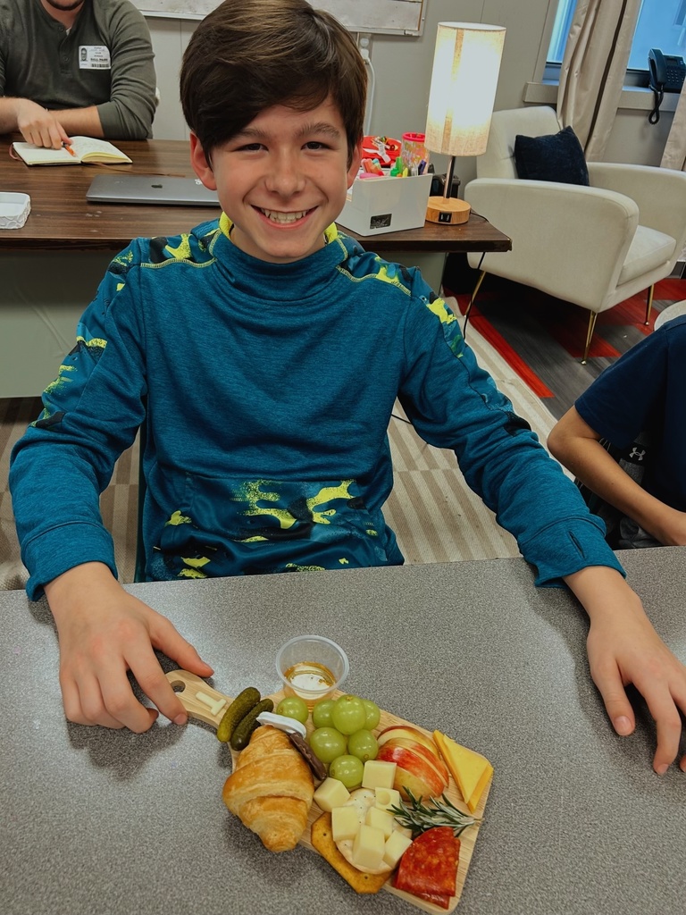 Student with charcuterie board