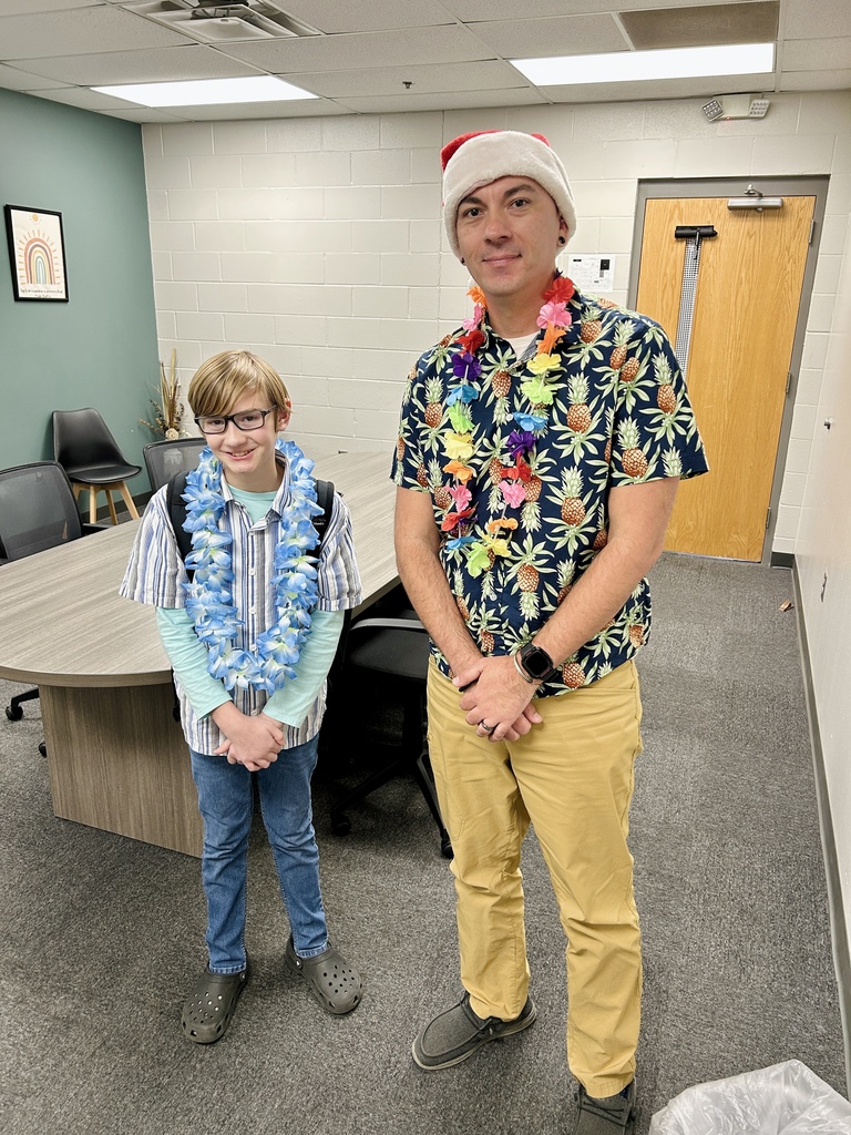 Staff and student during Hawaiian day