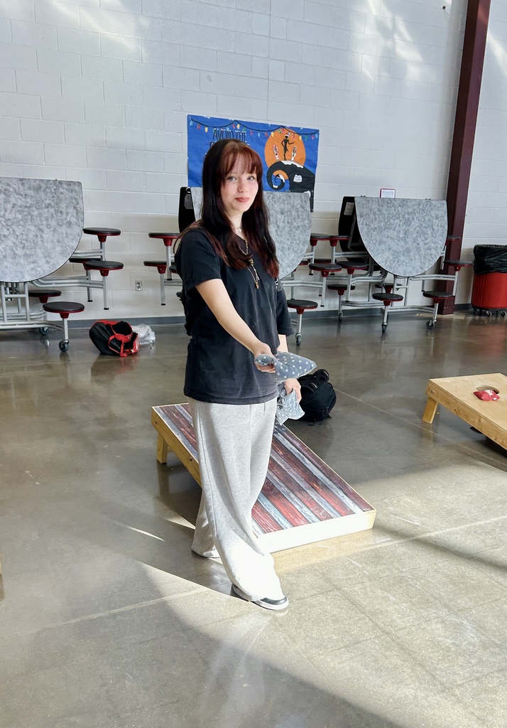 Student about to throw Baggo at Reward Day