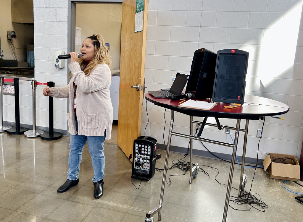 Mrs. Blodgett singing at Reward Day
