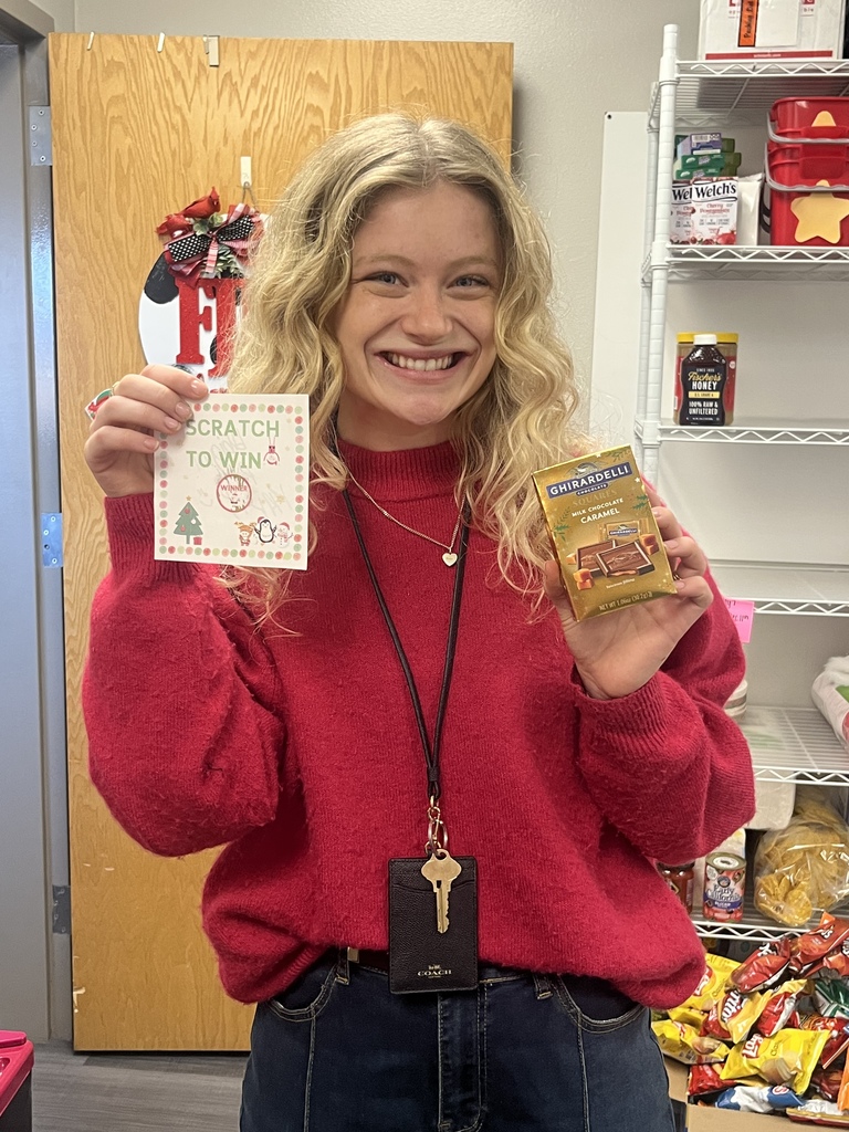 Teacher with scratch off prize