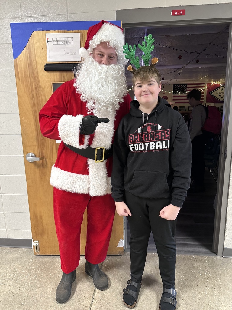 Mr. Frost as Santa with student