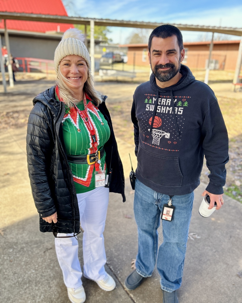 Dr. Morris & Mr. Pair in ugly Christmas sweaters