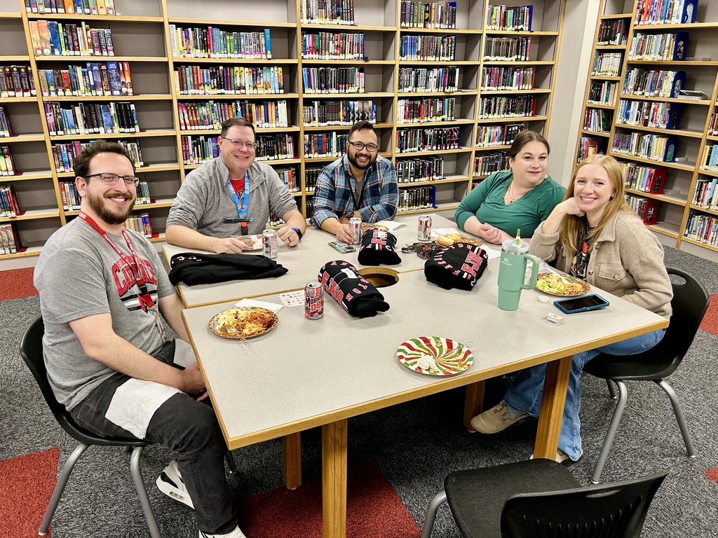 Teachers eating Mama Zs in the library