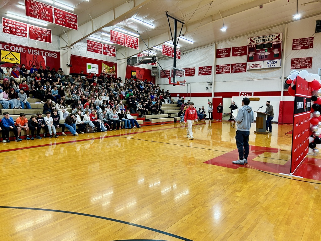 Student receiving an award at the Fall Awards assembly