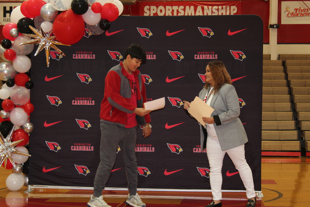 Student receiving an award at the Fall Awards assembly